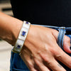 Triple Tanzanite Gold Bangle with Diamonds in Mother of Pearl