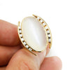 Oval White Cat's Eye Ring with Diamonds Yellow Gold