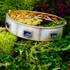 Triple Tanzanite Gold Bangle with Diamonds in Mother of Pearl