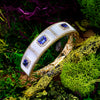 Triple Tanzanite Gold Bangle with Diamonds in Mother of Pearl