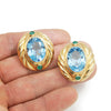 Oval Blue Topaz & Cabochon Emerald Omega Earrings Yellow Gold