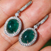 Oval Cabochon Emerald Drop Earrings with Diamonds White Gold