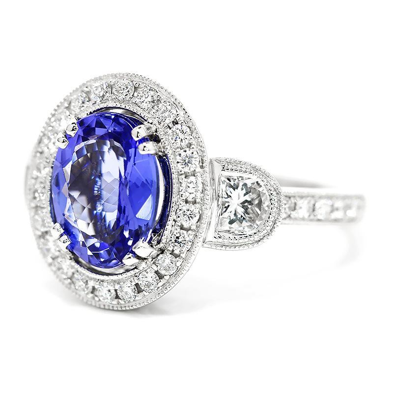 Oval Tanzanite Halo Ring with Half Moon Diamond’s 18K - Once Upon A Diamond