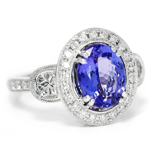 Oval Tanzanite Halo Ring with Half Moon Diamond’s 18K - Once Upon A Diamond